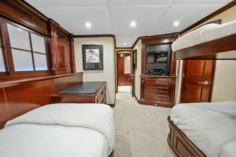 Slide: The Image of Luxurious 2005 Trinity Yachts Tri-Deck interior with elegant wood finishes and modern amenities. - 19