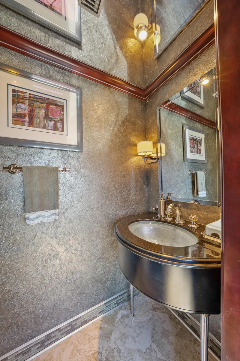 Slide: The Image of Luxurious bathroom on 2005 Trinity Yachts Tri-Deck, featuring elegant fixtures and modern design. - 37