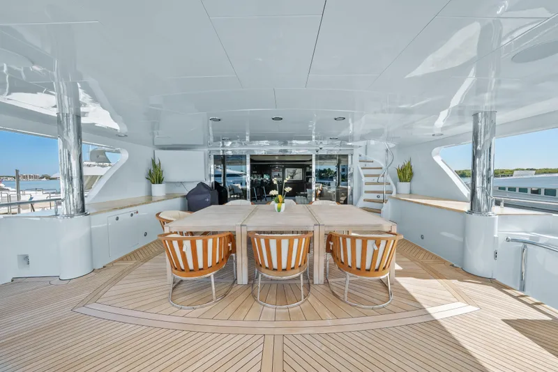 Slide: The Image of Luxurious 2005 Trinity Yachts Tri-Deck with elegant outdoor dining area and modern design. - 46