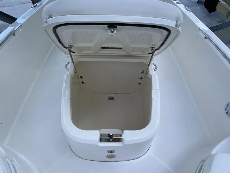Slide: The Image of Open storage compartment on 2016 Boston Whaler 270 Dauntless boat. - 10