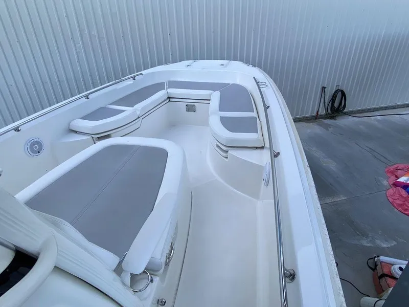 Slide: The Image of 2016 Boston Whaler 270 Dauntless boat with spacious seating and sleek design. - 2