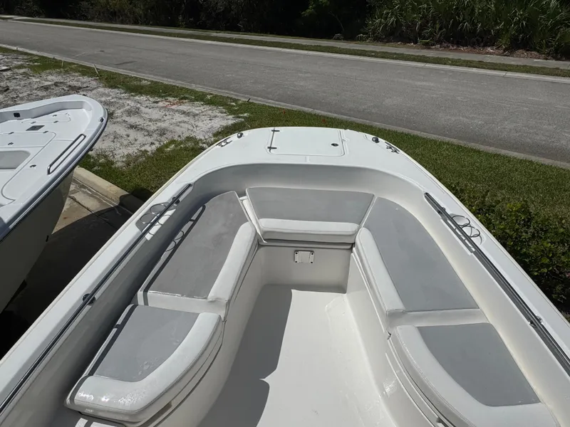 Slide: The Image of 2016 Boston Whaler 270 Dauntless boat with spacious seating and sleek design. - 20