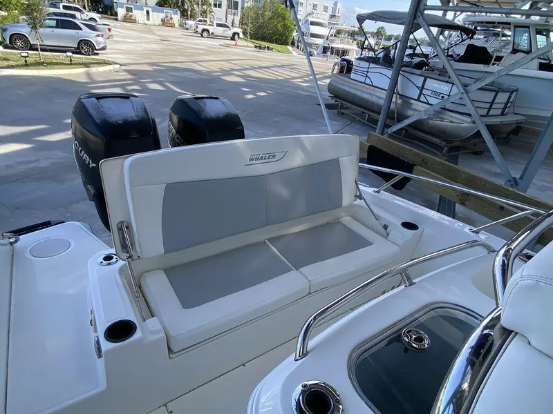 Slide: The Image of 2016 Boston Whaler 270 Dauntless boat with dual engines and comfortable seating. - 7