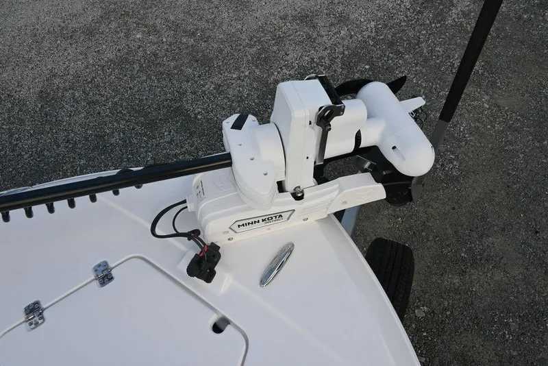 Slide: The Image of Minn Kota trolling motor on 2025 Caymas 26 HB boat deck. - 10