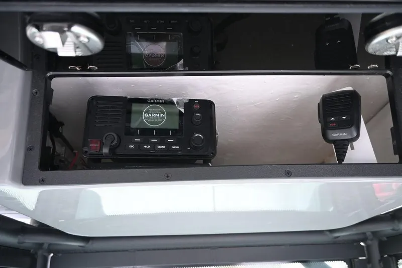 Slide: The Image of 2025 Caymas 26 HB boat with Garmin marine radio system. - 20