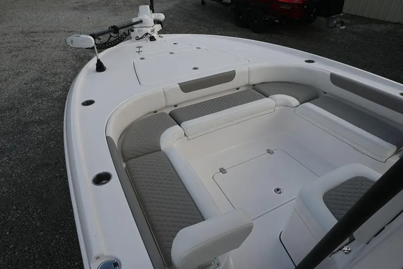 Slide: The Image of 2025 Caymas 26 HB boat interior with cushioned seating and sleek design. - 28