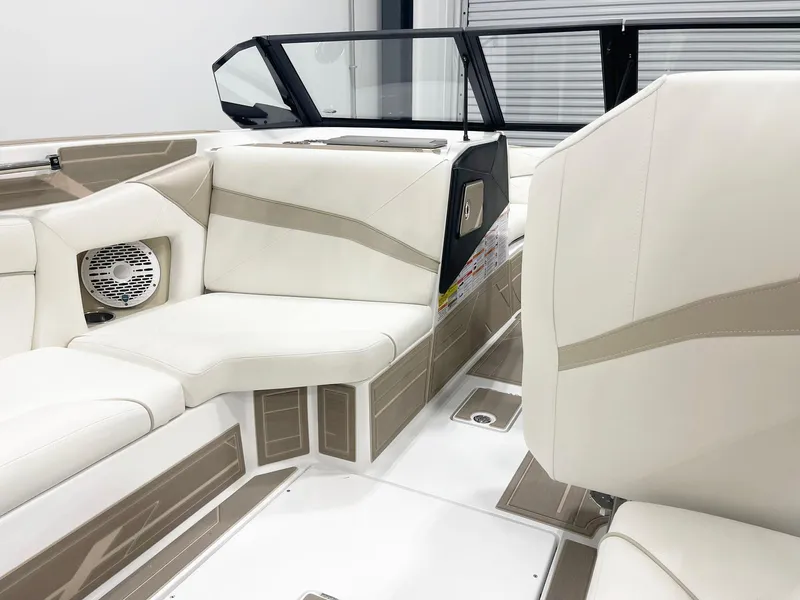 Slide: The Image of Luxurious interior of 2025 Centurion NV213 boat with beige seating and modern design. - 8