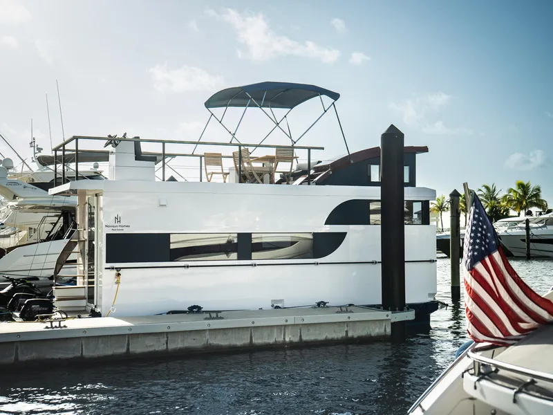 Slide: The Image of 2024 Navisyo Homes 28' NAVIS V.08 yacht docked at marina, sunny day. - 26