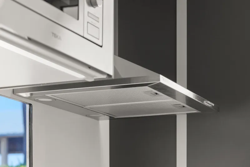 Slide: The Image of Modern kitchen range hood in Navisyo Homes 28' NAVIS V.08, 2024 model. - 49