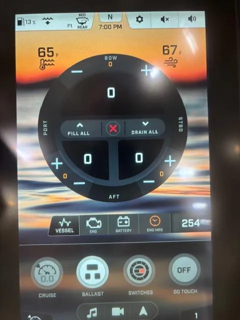 Slide: The Image of Touchscreen control panel of a 2020 Tigé 20RZX boat displaying temperature and settings. - 19