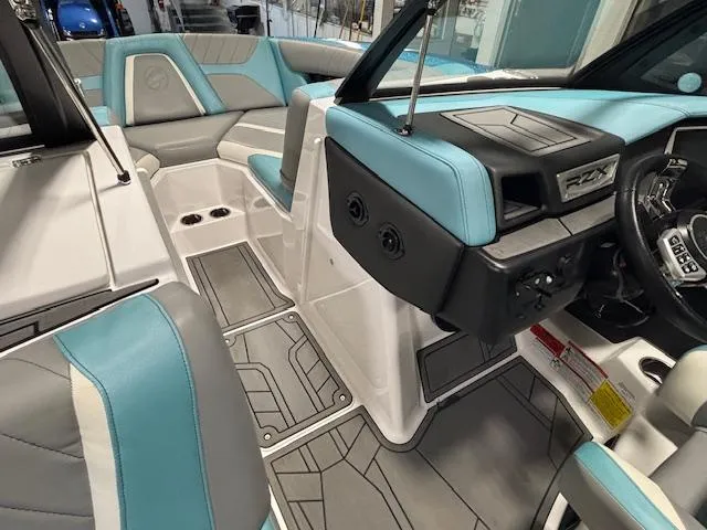 Slide: The Image of Interior of 2020 Tigé 20RZX boat with modern seating and dashboard design. - 26