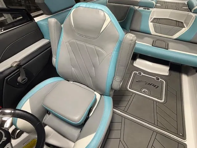 Slide: The Image of 2020 Tigé 20RZX boat interior with gray and blue seating, modern design. - 32