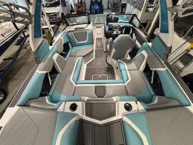 Slide: The Image of 2020 Tigé 20RZX boat interior with modern seating and sleek design. - 8