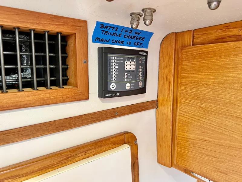 Slide: The Image of Battery charger panel in a 2000 Catalina 320 sailboat interior. - 39