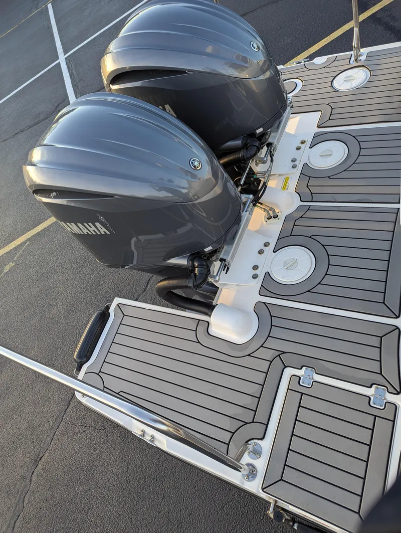 Slide: The Image of 2022 Cutwater C-32 CB boat with dual Yamaha outboard engines on deck. - 14