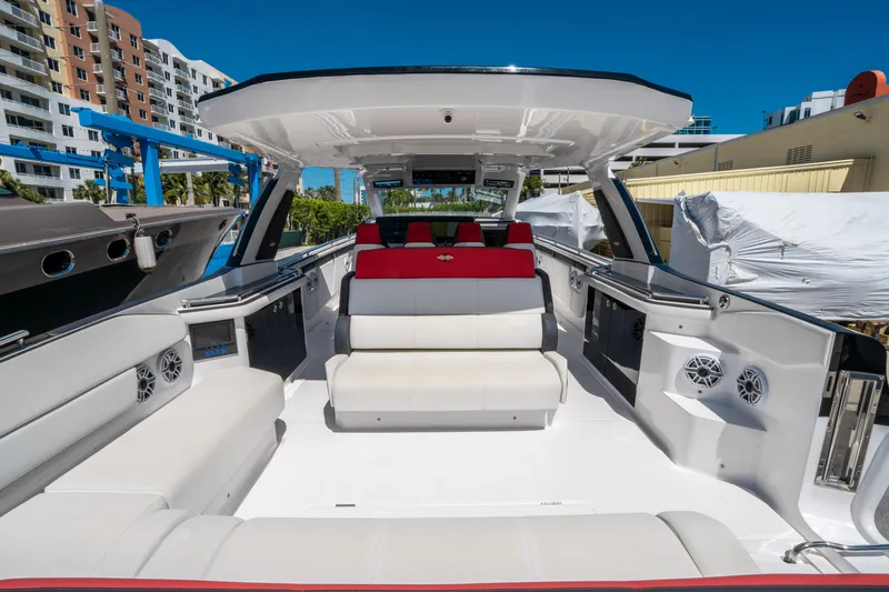 Slide: The Image of 2021 Cigarette 59 Tirranna luxury boat interior with white and red seating. - 11