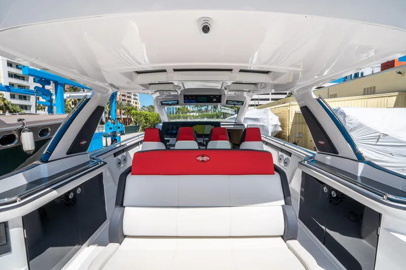 Slide: The Image of 2021 Cigarette 59 Tirranna luxury boat interior with red and white seating. - 21