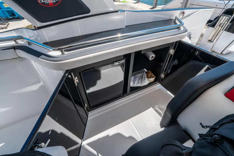 Slide: The Image of 2021 Cigarette 59 Tirranna boat interior with sleek storage compartments and modern design. - 35