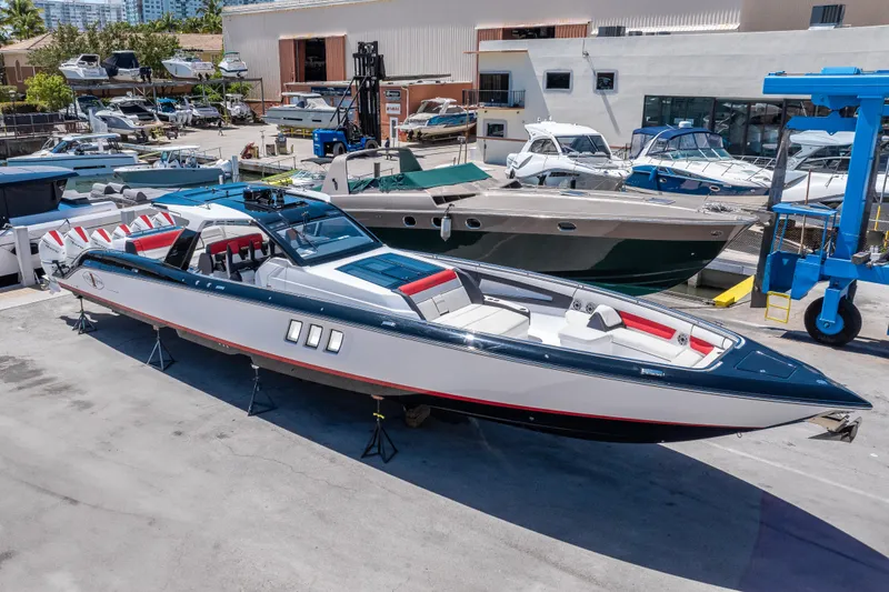 Slide: The Image of 2021 Cigarette 59 Tirranna luxury speedboat docked at a marina. - 5