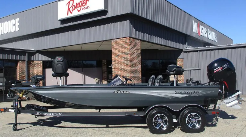 The Image of 2025 Ranger RT198P boat displayed outside dealership. - 1