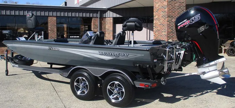 Slide: The Image of 2025 Ranger RT198P fishing boat with powerful outboard motor on a trailer. - 3