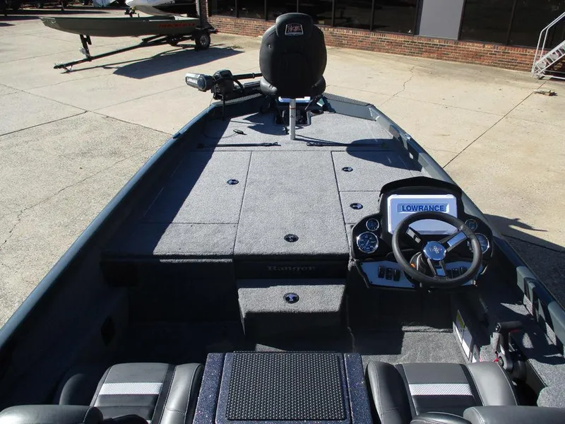 Slide: The Image of 2025 Ranger RT198P fishing boat interior with steering console and seating. - 4
