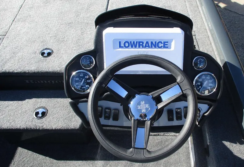 Slide: The Image of 2025 Ranger RT198P boat dashboard with Lowrance Elite display and steering wheel. - 5