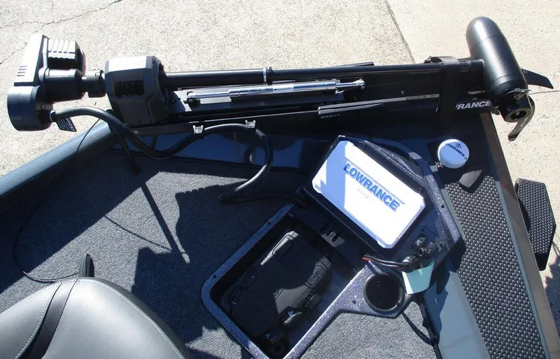 Slide: The Image of 2025 Ranger RT198P boat with Lowrance fishfinder and trolling motor on deck. - 6