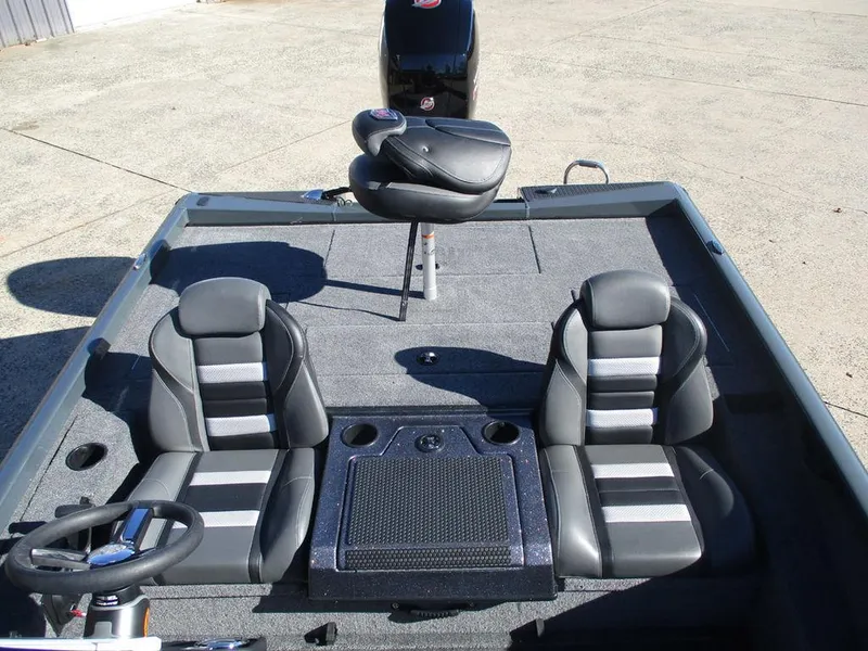 Slide: The Image of 2025 Ranger RT198P boat interior with dual seats and steering wheel. - 8