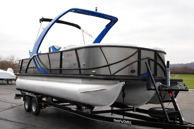 Slide: The Image of 2019 South Bay 523SB2 pontoon boat on trailer, featuring sleek design and modern architecture. - 3