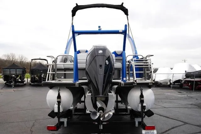 Slide: The Image of 2019 South Bay 523SB2 pontoon boat with outboard motor, parked on trailer. - 6