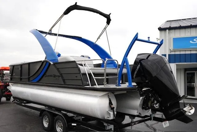 Slide: The Image of 2019 South Bay 523SB2 pontoon boat on trailer, featuring sleek design and powerful outboard motor. - 7