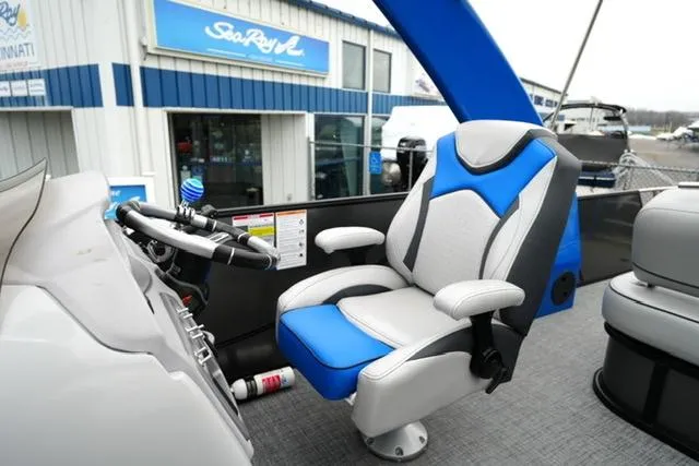 Slide: The Image of 2019 South Bay 523SB2 boat helm with blue and gray captain's chair. - 9
