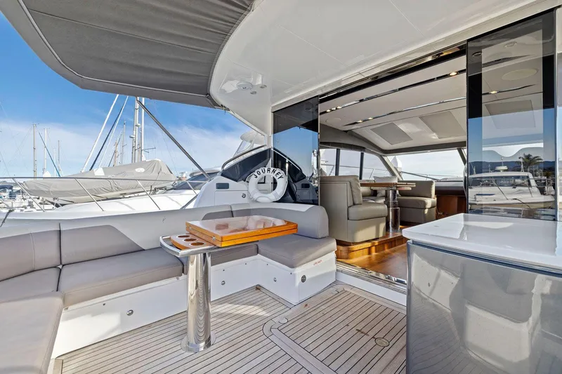 Slide: The Image of Luxurious 2019 Princess V50 yacht interior with elegant seating and modern design. - 21