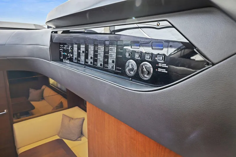 Slide: The Image of Control panel inside 2019 Princess V50 yacht, featuring modern design and comfortable seating area. - 31