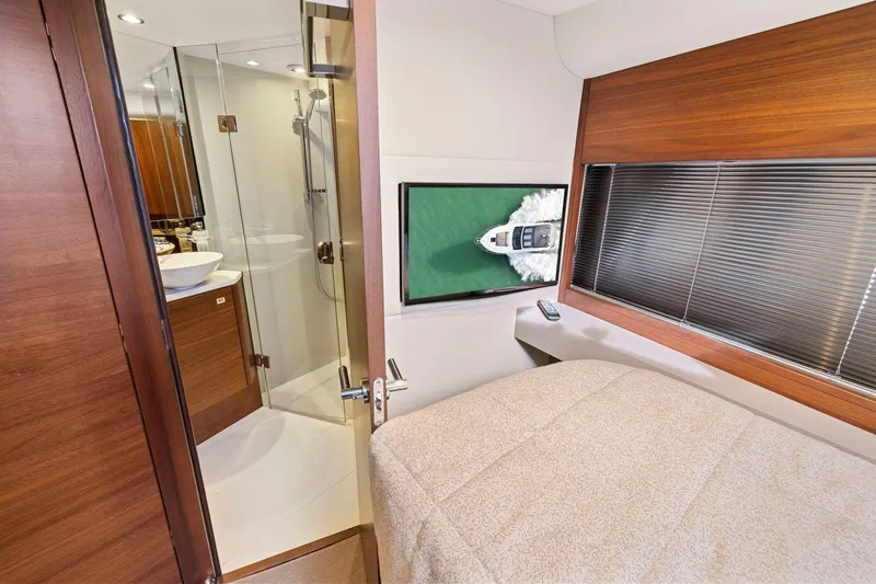 Slide: The Image of Luxurious 2019 Princess V50 yacht cabin with ensuite bathroom and window view. - 44