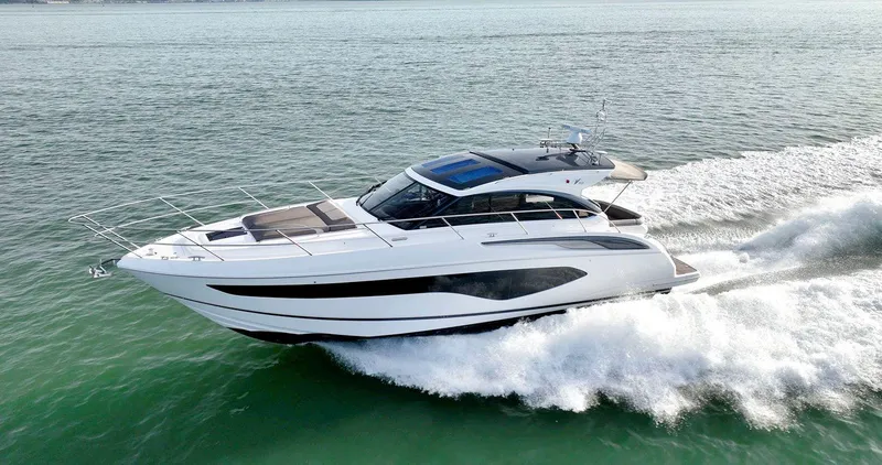 Slide: The Image of 2019 Princess V50 yacht cruising on open water. - 7