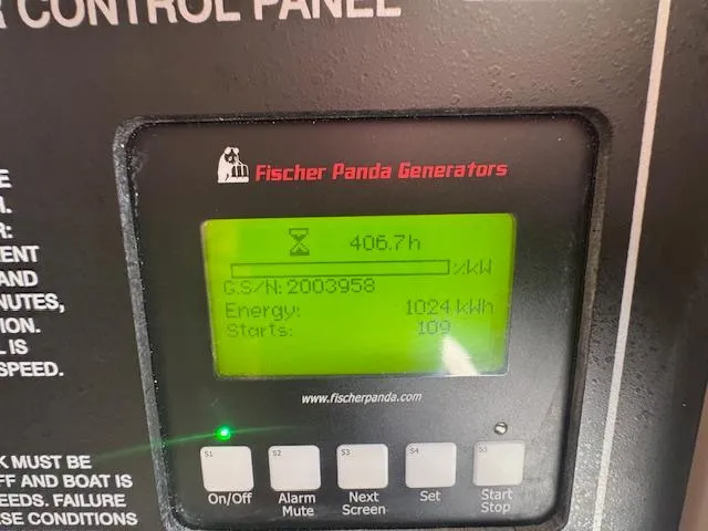 Slide: The Image of Fischer Panda generator control panel on 2021 Grady-White Express 370 boat. - 26
