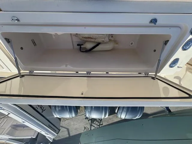Slide: The Image of Open storage compartment on 2021 Grady-White Express 370 boat. - 6
