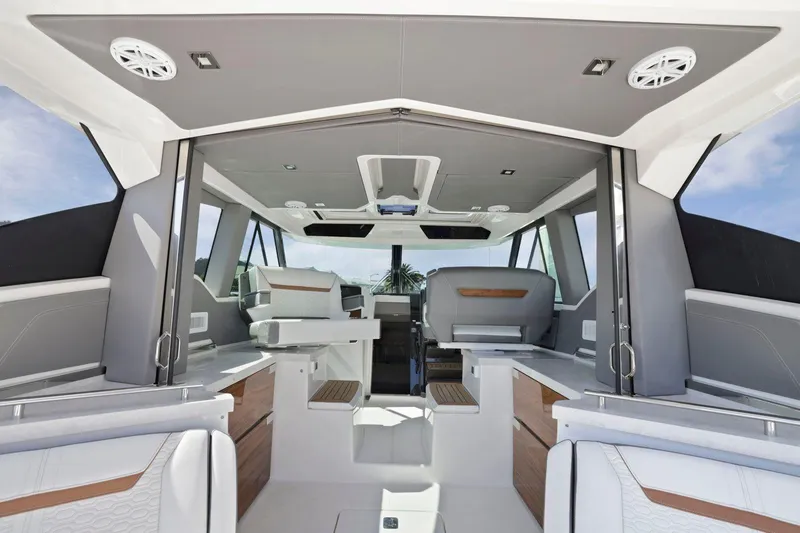 Slide: The Image of Interior of 2022 Tiara Yachts 43 LE, featuring modern design and luxurious seating. - 21