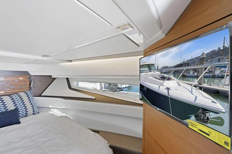Slide: The Image of Interior of 2022 Tiara Yachts 43 LE with modern design and window view. - 30