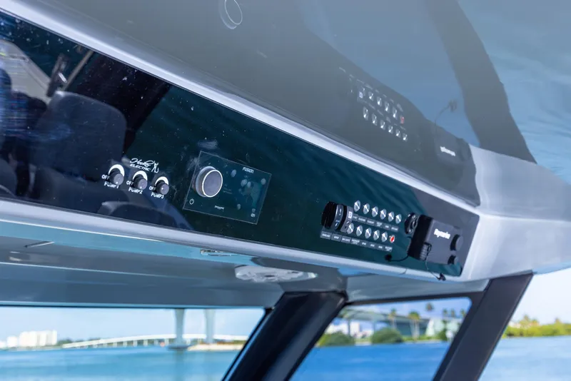 Slide: The Image of Control panel of 2024 Aquila 47 Molokai yacht with scenic water view. - 17