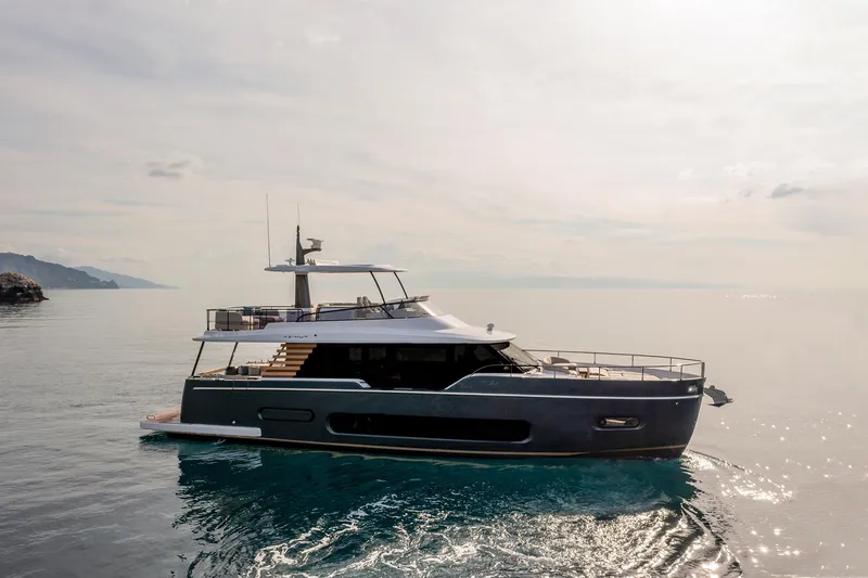 Slide: The Image of 2024 Azimut Magellano 60 yacht cruising on calm waters. - 41
