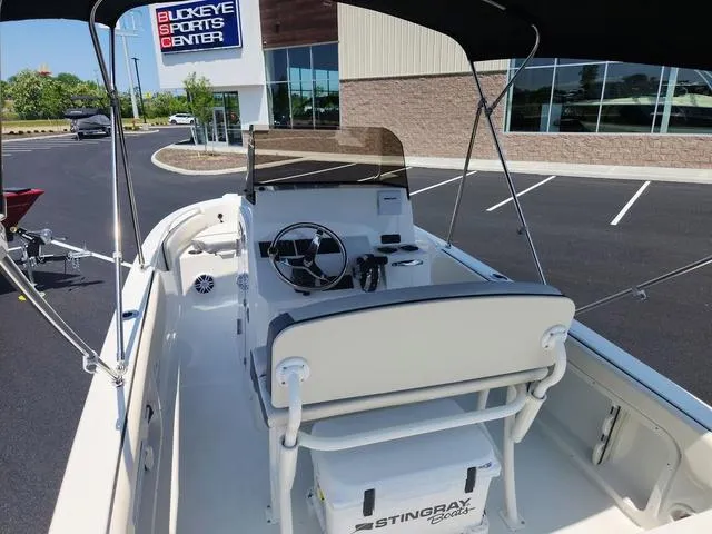 Slide: The Image of 2023 Stingray 173 CC boat at Buckeye Sports Center parking lot. - 30