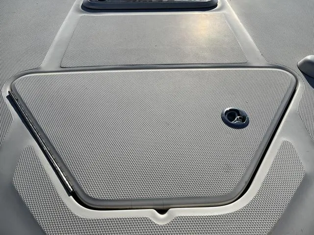 Slide: The Image of Close-up of 2005 Sea Ray 225 Weekender boat deck hatch. - 32