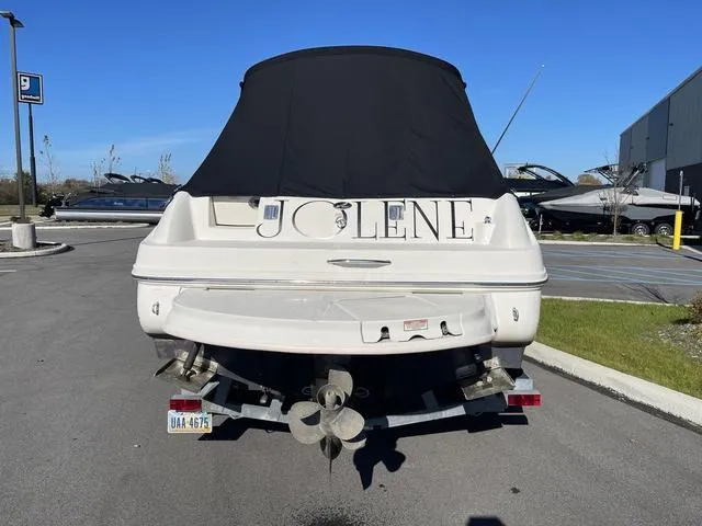 Slide: The Image of 2005 Sea Ray 225 Weekender boat named "Jolene" on a trailer in a parking lot. - 5