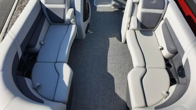 Slide: The Image of 2024 Barletta Cabrio C24UE boat interior with spacious seating and modern design. - 10