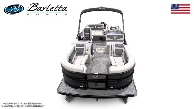 Slide: The Image of 2024 Barletta Cabrio C24UE pontoon boat, spacious seating, elegant design, American flag. - 7