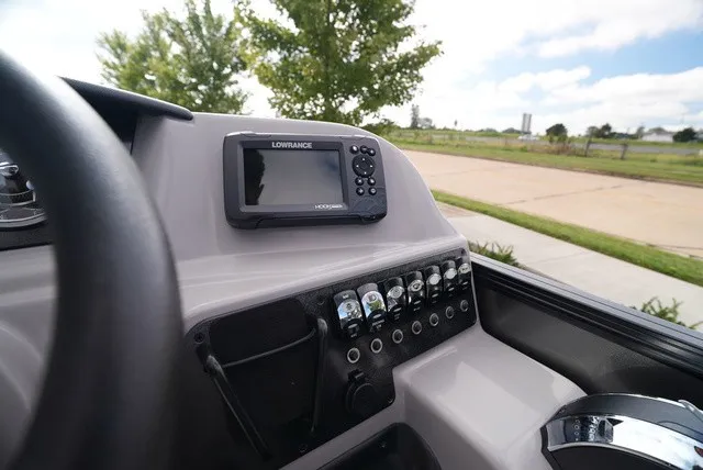 Slide: The Image of The image shows the dashboard of a Barletta Aria A22CC boat with a Lowrance fish finder. - 30