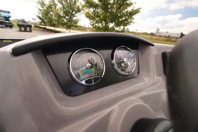 Slide: The Image of Close-up of a Barletta Aria A22CC dashboard with two round gauges. - 28